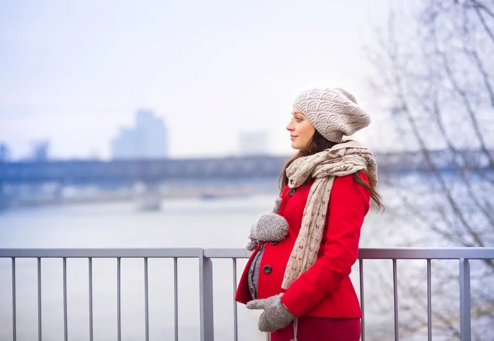 pregnant woman in winter clothes