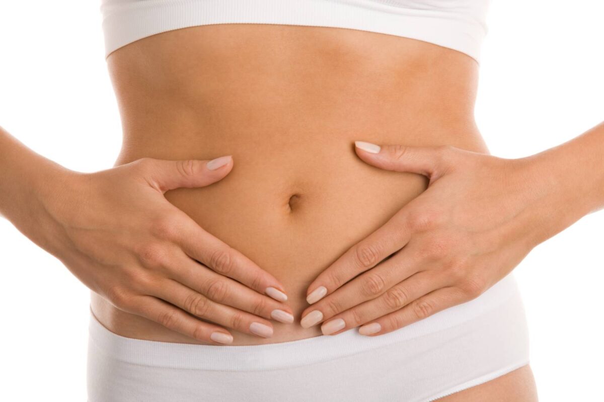 Woman's hands on stomach